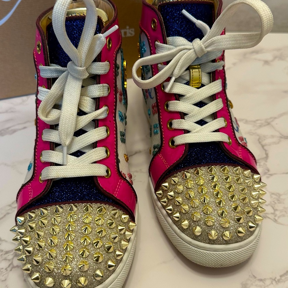 Christian Louboutin sneakers size 35.5 fits a size 6 multi color high top